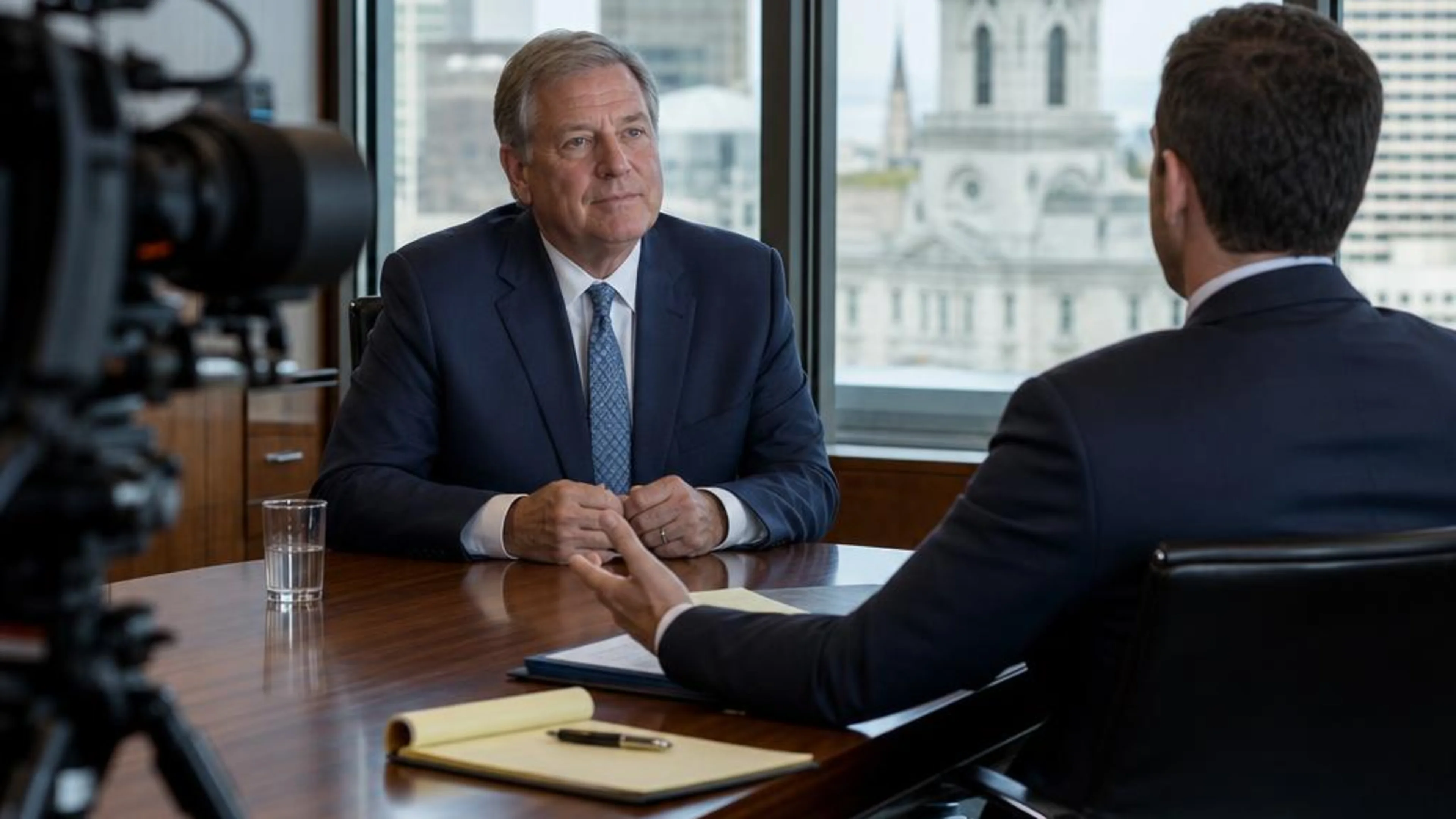 Videotaped deposition in Connecticut with counsel questioning a witness while a professional legal video camera records the testimony